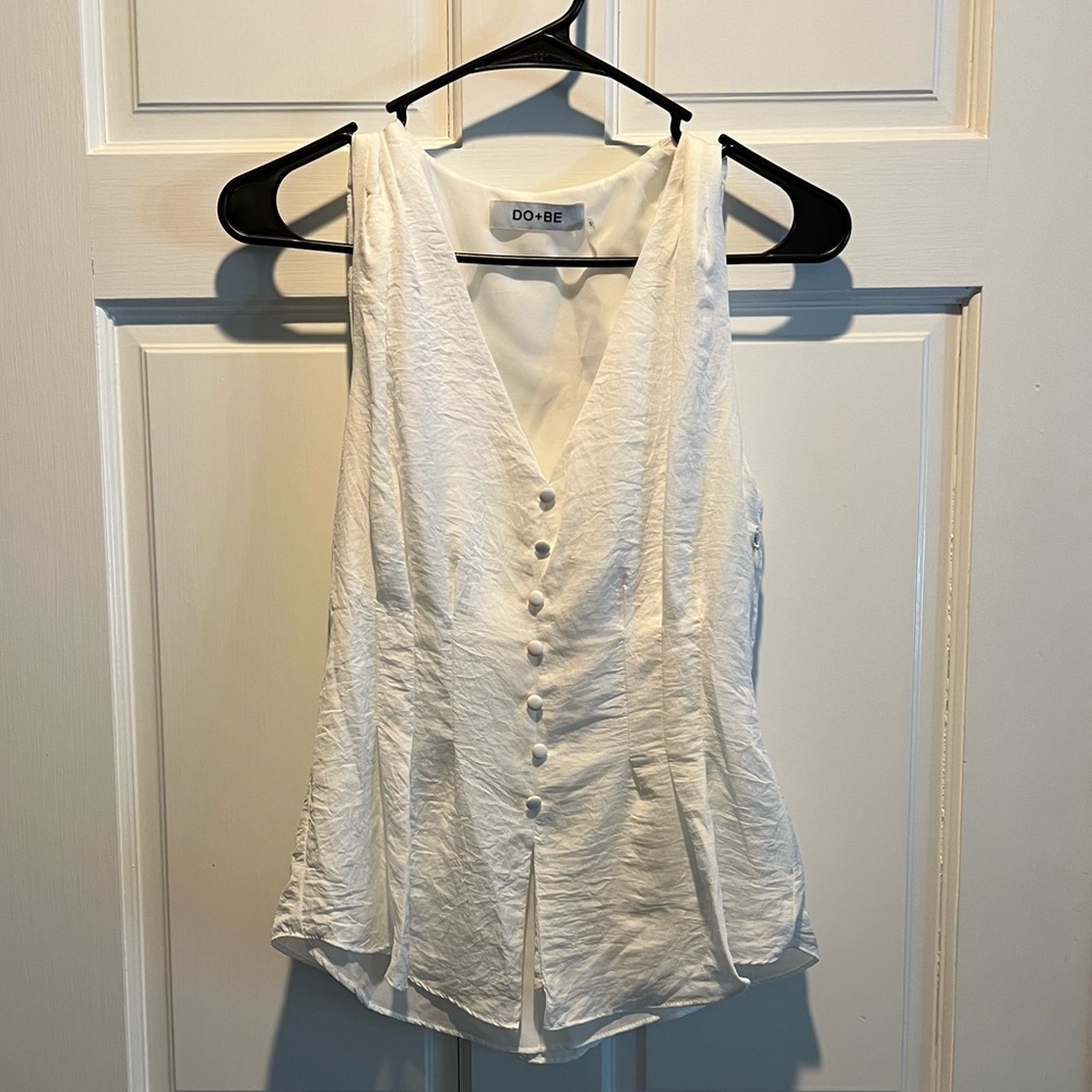 White Sleeveless Blouse